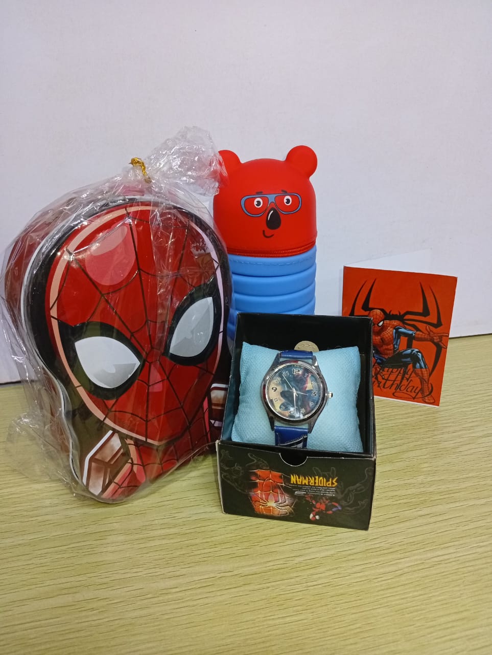Piggy bank, pencil pouch, watch + free gift card