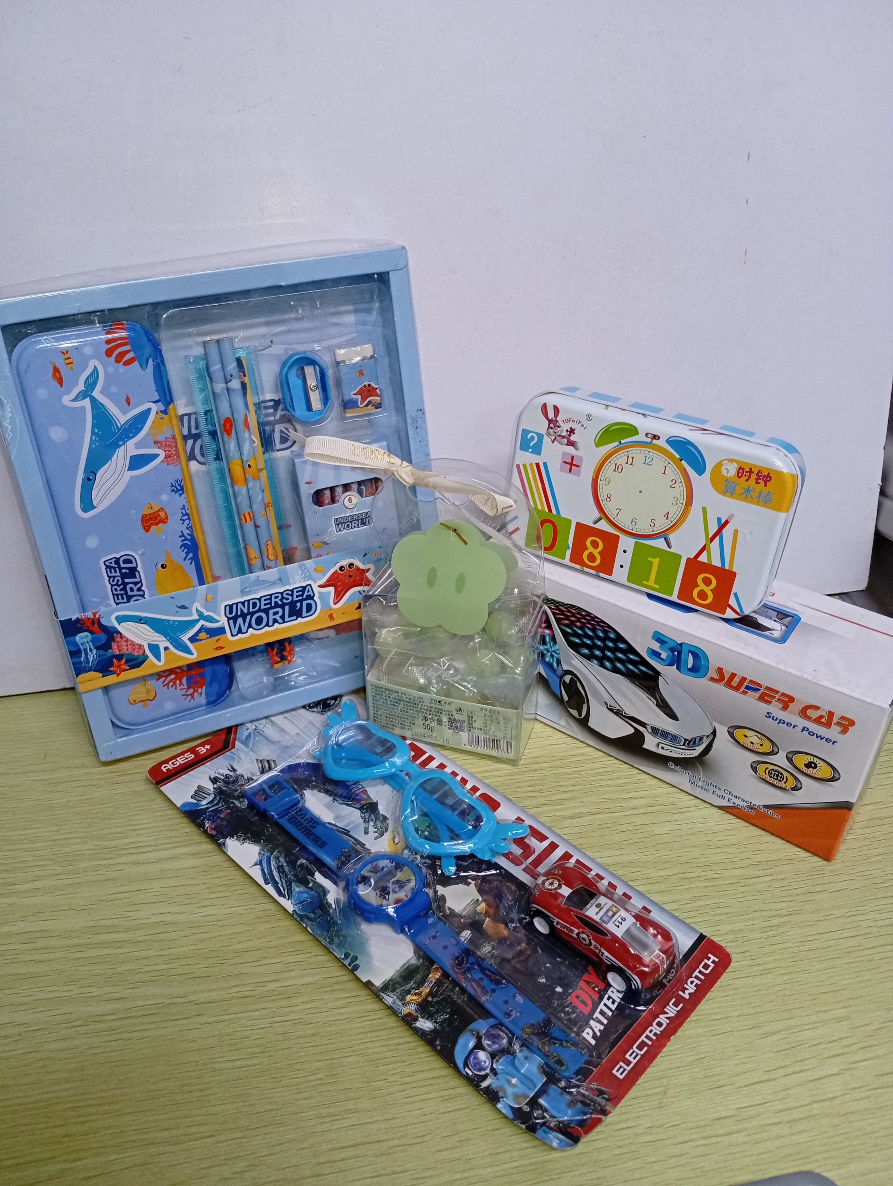 Boy's gift set (Stationery set, maths solver, candy pack, watch set)Get a free gift card